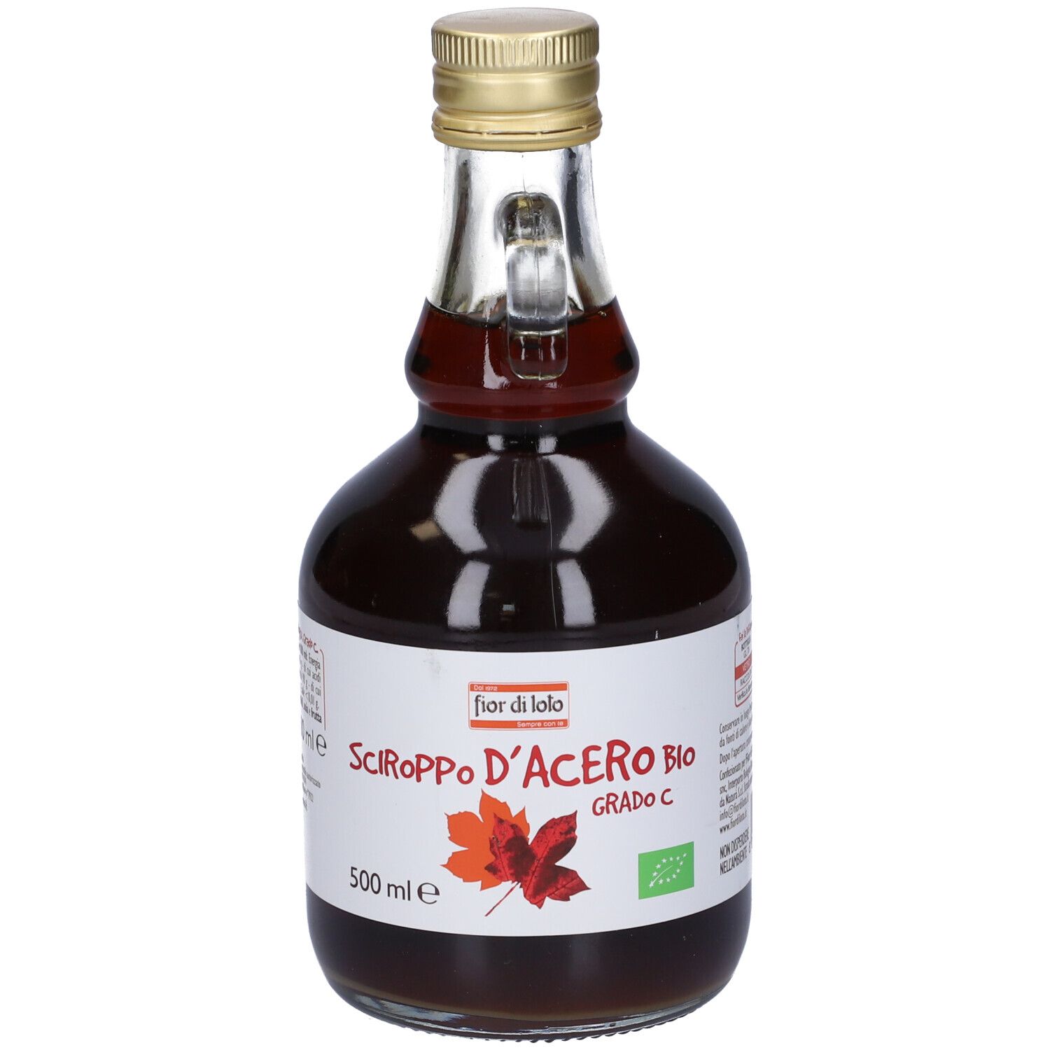 Bottiglia di sciroppo d'acero. Etichetta con testo, foglia d'acero e sigillo bio. Tappo dorato. 500 ml.