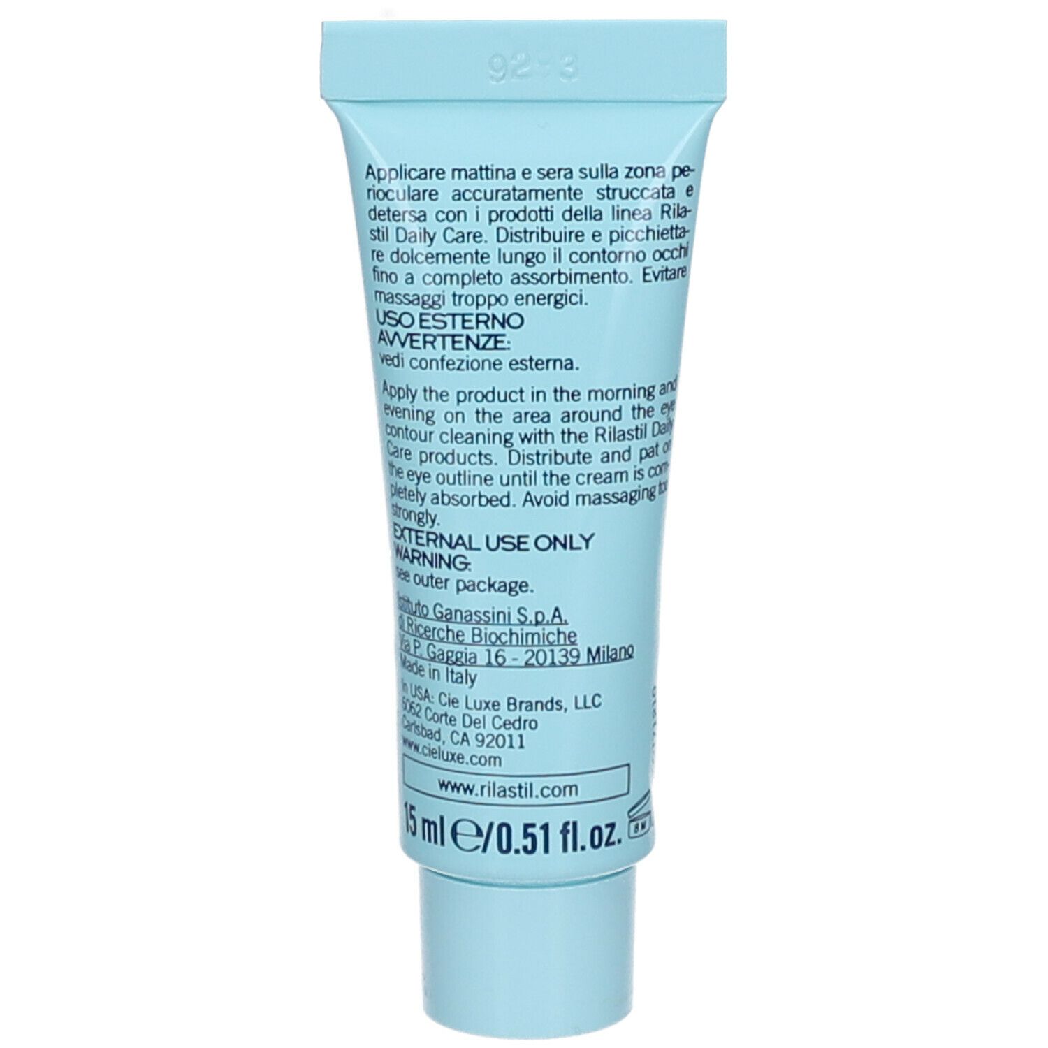 Dos d'un tube bleu clair. Texte : Instructions d'utilisation en italien et en anglais, ingrédients.