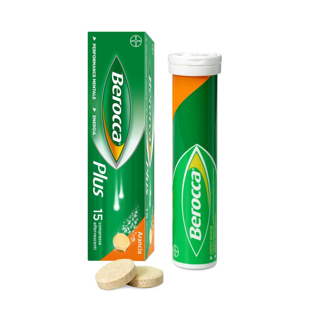 Berocca Plus-Packung und Röhre mit Brausetabletten. Zwei Tabletten daneben. Orangengeschmack.