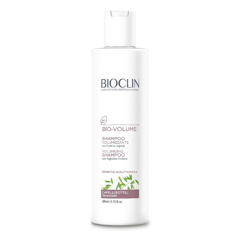 Flacone bianco di shampoo BIOCLIN Bio-Volume. Testo: Bio-Volume, Shampoo Volumizzante. Per capelli sottili.