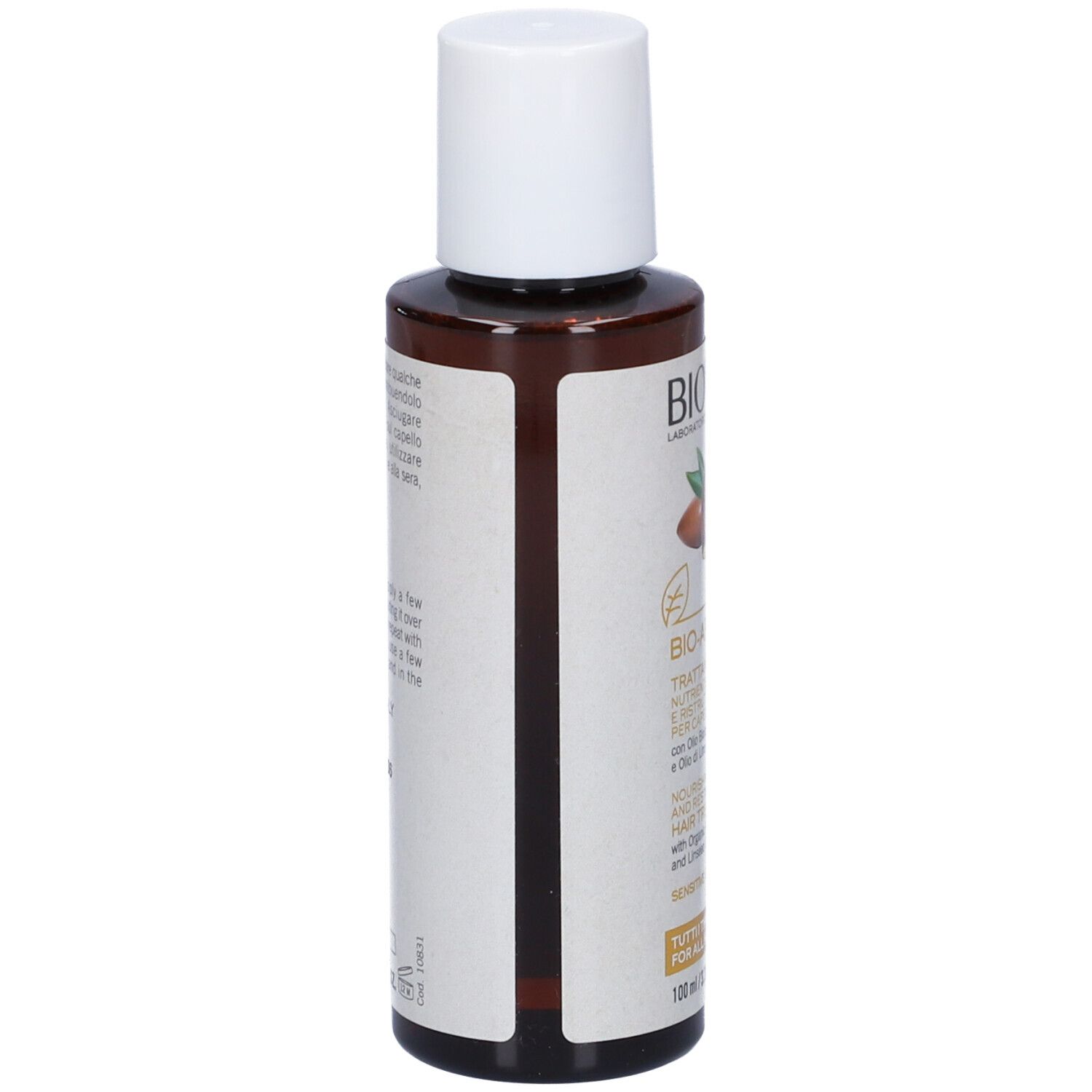 Flacone marrone con tappo bianco. Scritta: BIOCLIN, BIO-ARGAN, Trattamento, con olio di Argan e lino.