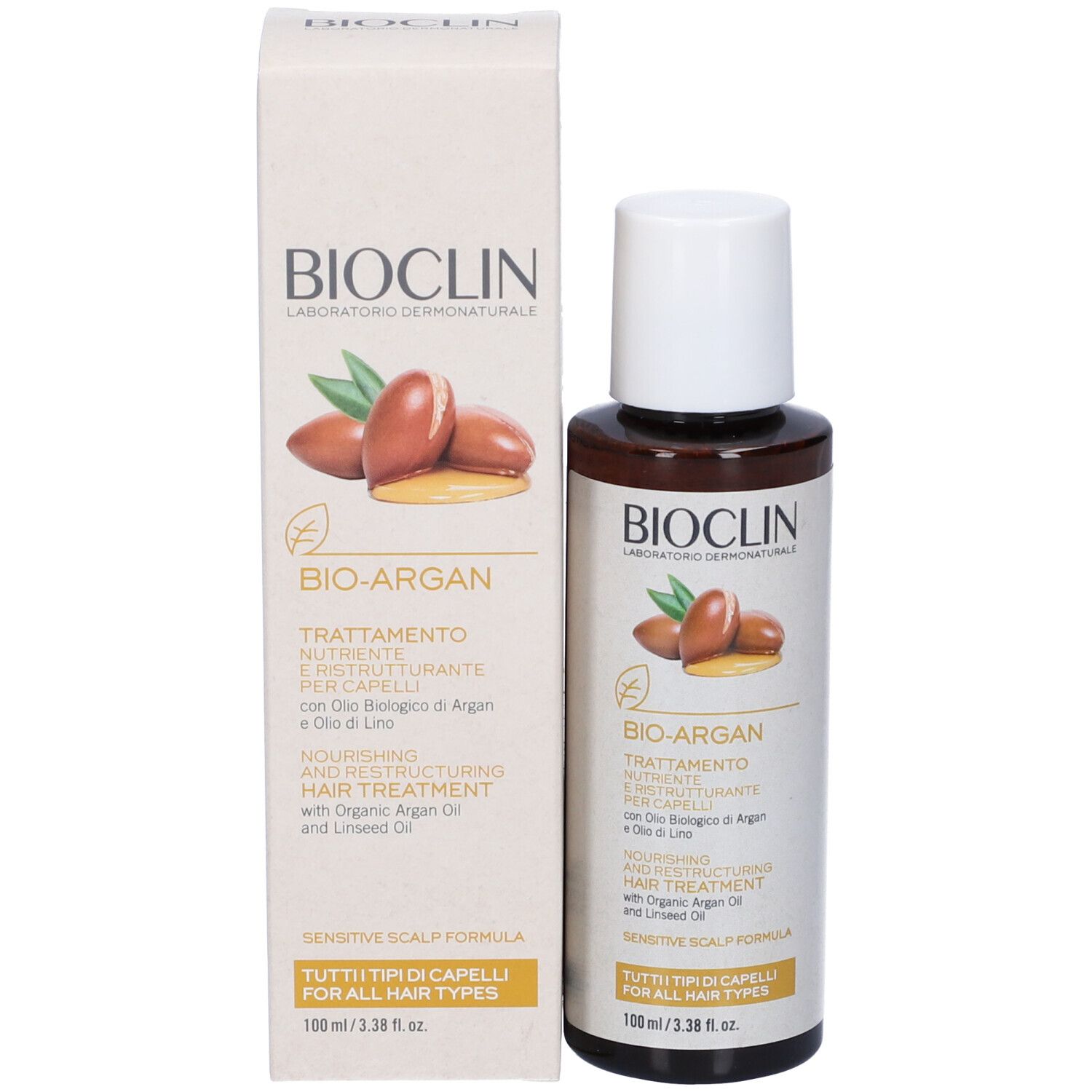 Prodotto e confezione. Flacone marrone con tappo bianco e scatola. Scritta: BIOCLIN, BIO-ARGAN, Trattamento.
