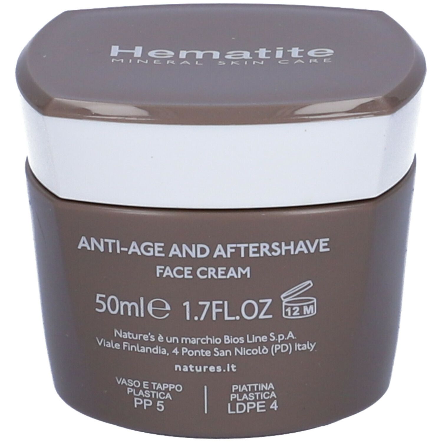 Vaso di crema marrone con coperchio bianco. Scritta: Hämatite, 50ml, 1.7FL.OZ, Anti-età e Dopobarba.