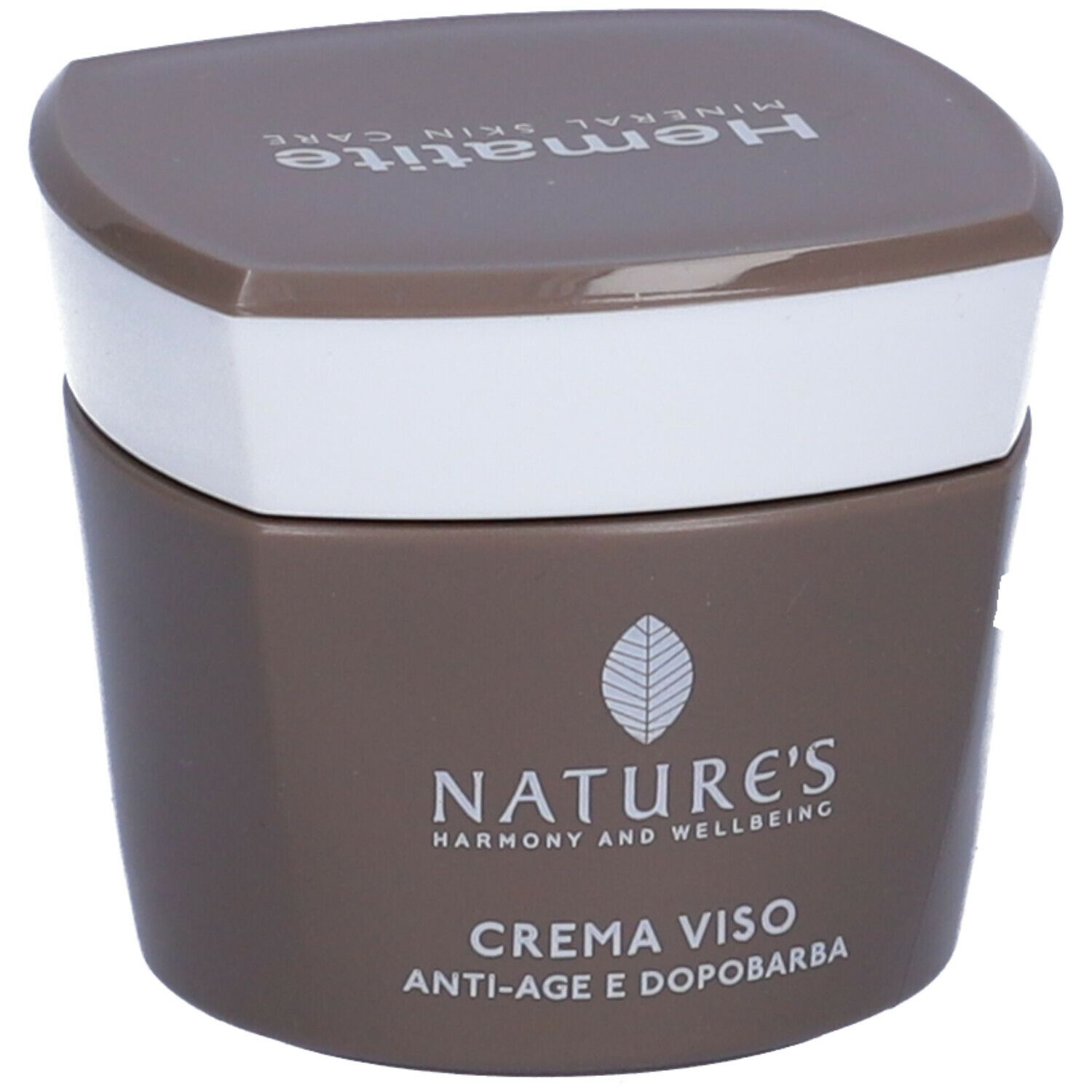 Vaso di crema marrone con coperchio bianco. Scritta: Hämatite, NATURE'S, CREMA VISO, Anti-età e Dopobarba.