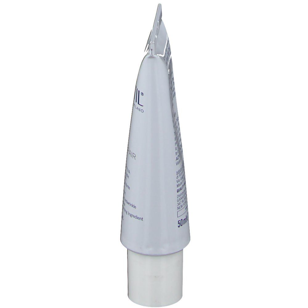 Vista laterale del tubo bianco. Scritta in italiano e inglese. Contiene 50 ml di crema.