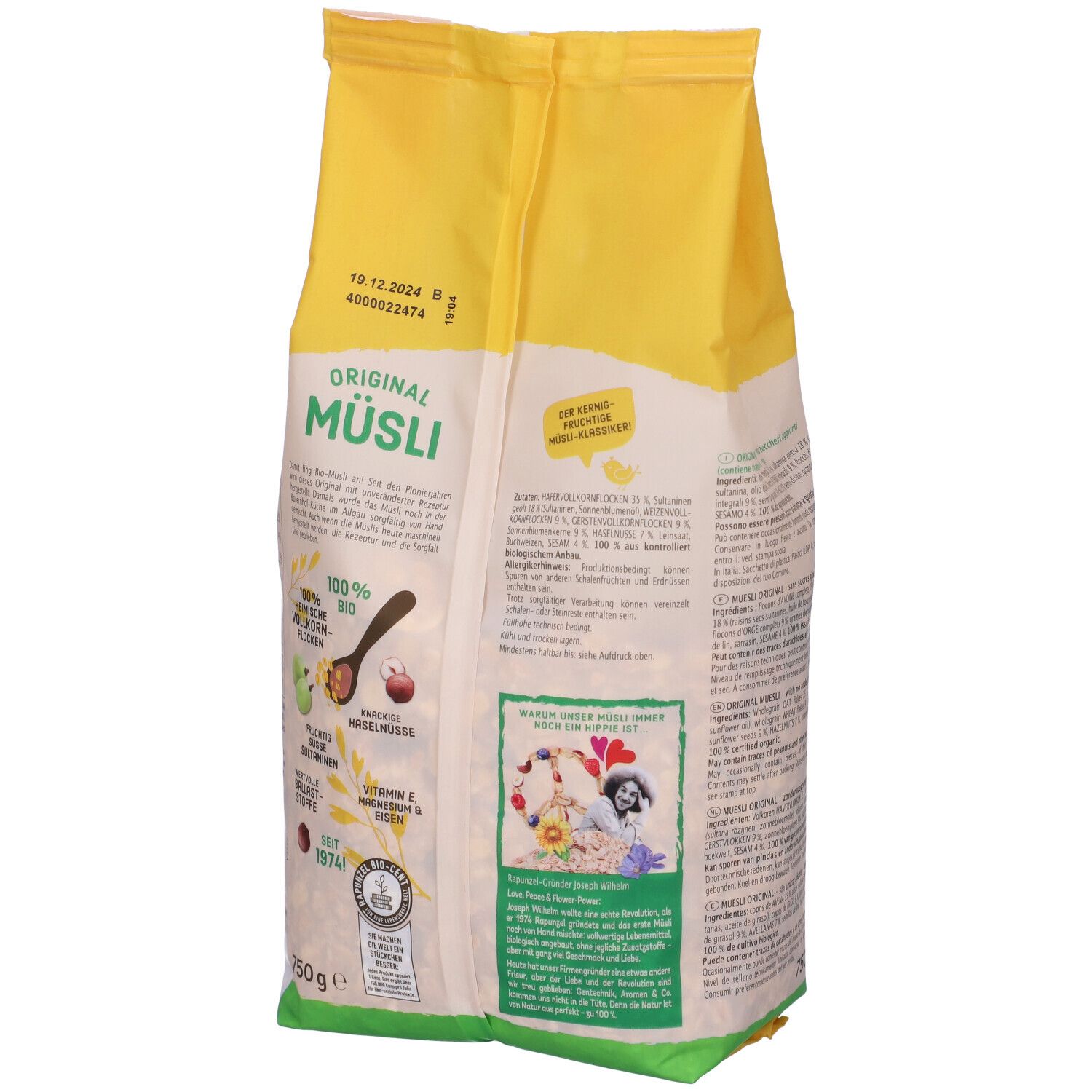 Retro della confezione di Muesli Original Rapunzel. Sacchetto giallo-bianco con valori nutrizionali, marchio bio e scadenza.