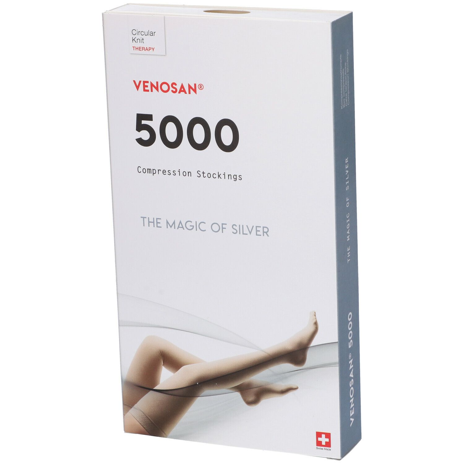 Confezione Venosan 5000 in diagonale. Scritte: Venosan 5000, Compression Stockings, The Magic of Silver. Croce svizzera. Immagine di gambe.