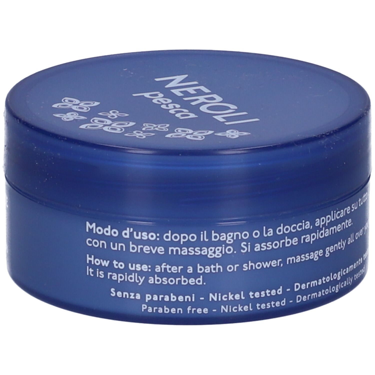 Barattolo di crema blu. Scritta: Nature's, Neroli Pesca, Crema Corpo Nutriente.
