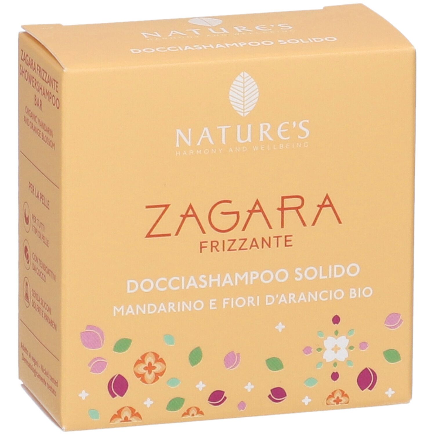 Scatola gialla con informazioni prodotto. Scritto: Nature's, Zagara Frizzante, Docciashampoo Solido, Mandarino e Fiori d'Arancio Bio.