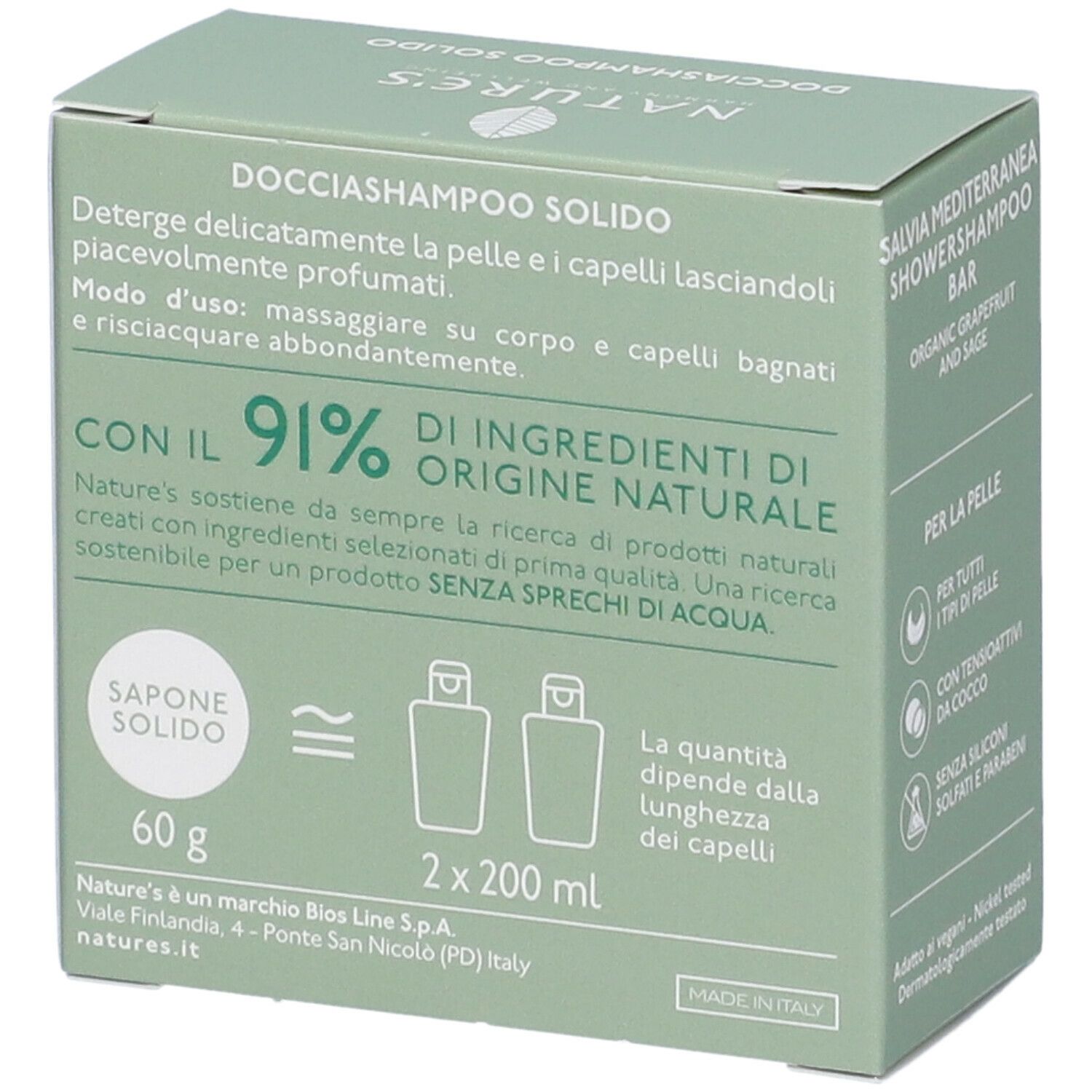 Scatola verde con informazioni sul prodotto. Contiene 'Docciashampoo Solido' e '91% di ingredienti di origine naturale'.