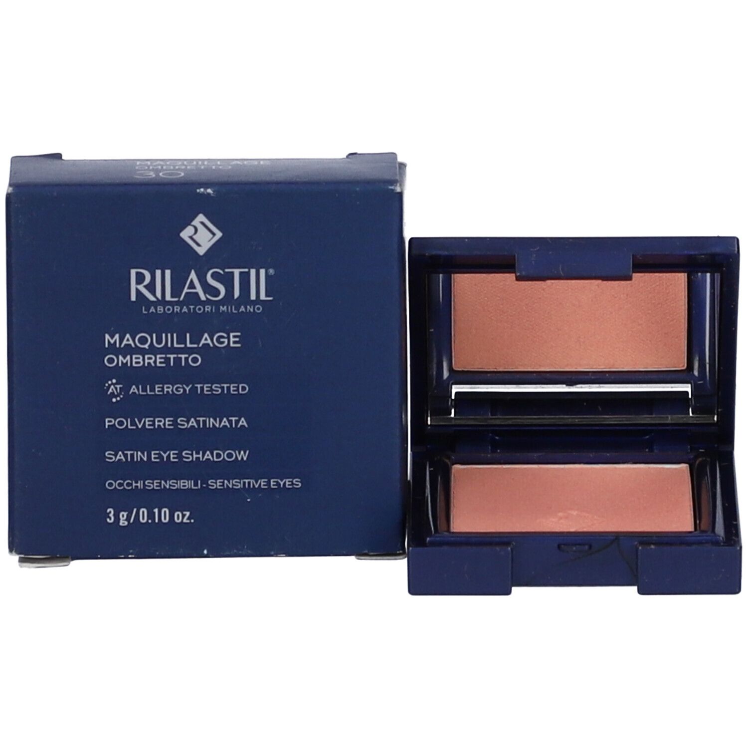 Astuccio cosmetico blu con ombretto e confezione. Sulla confezione c'è scritto Rilastil.