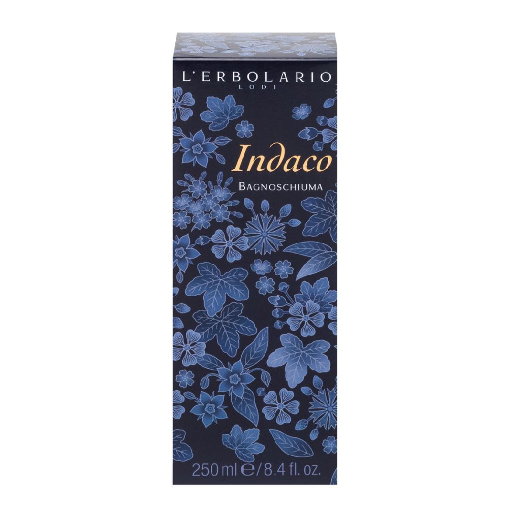 Confezione in cartone con motivo floreale blu. Scritta: Indaco Bagnoschiuma, 250 ml. Marchio: L'Erbolario.