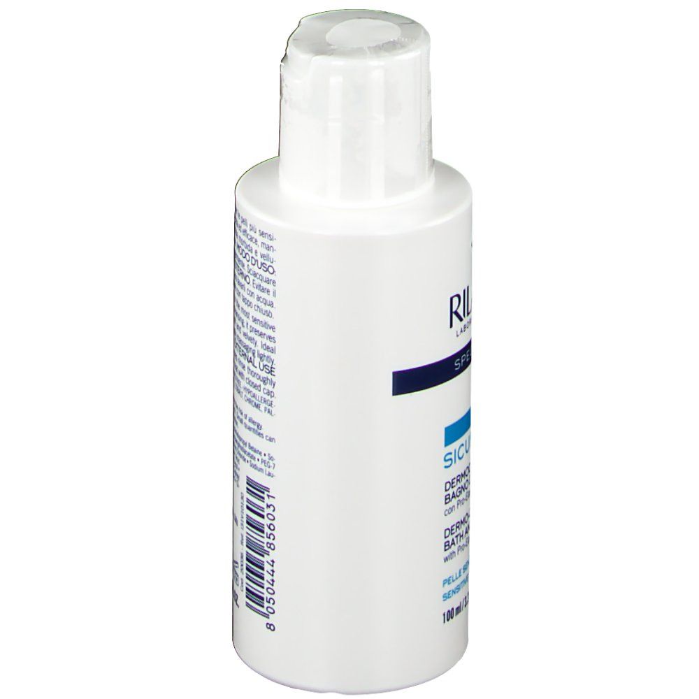 Flacone bianco, vista laterale. Scritta: RILASTIL, Sicurphase. Testo in italiano. Con tappo bianco.
