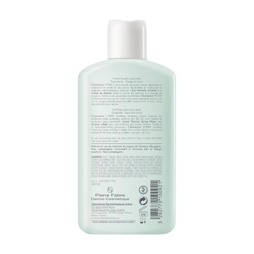 Retro del flacone verde chiaro. Testo multilingue. Logo del produttore e codice a barre.