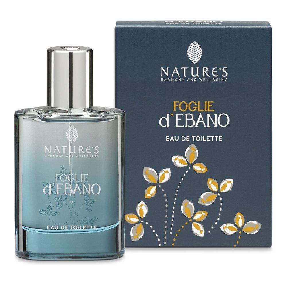 Flacone e scatola di Eau de Toilette. Scritta: Foglie d'Ebano, Nature's. Liquido blu in flacone di vetro.
