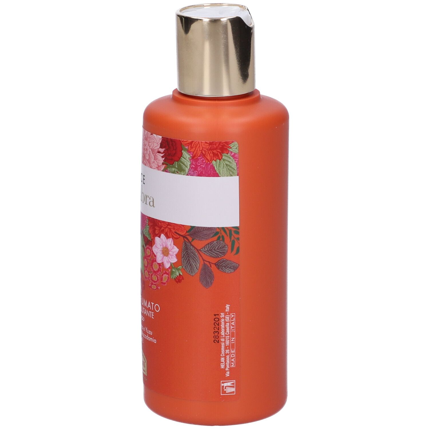 Flacone arancione con tappo dorato. Testo: Gocce d'Ambra, Latte Profumato. Marchio: Helan. 200 ml.