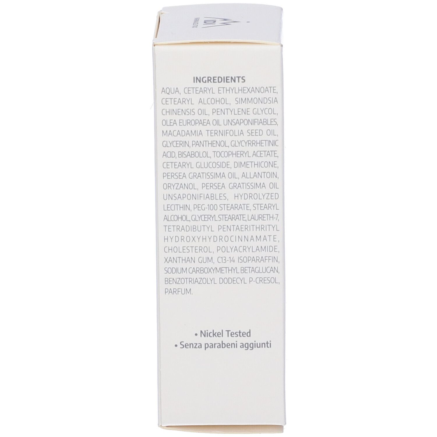 Scatola bianca con ingredienti. Testo: Aqua, Cetearyl Alcohol, Simmondsia Chinensis Oil, Nickel Tested, Senza parabeni.