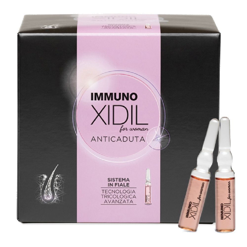 Scatola nera con fascia rosa. Scritta: IMMUNO XIDIL for woman ANTICADUTA. Due fiale accanto.