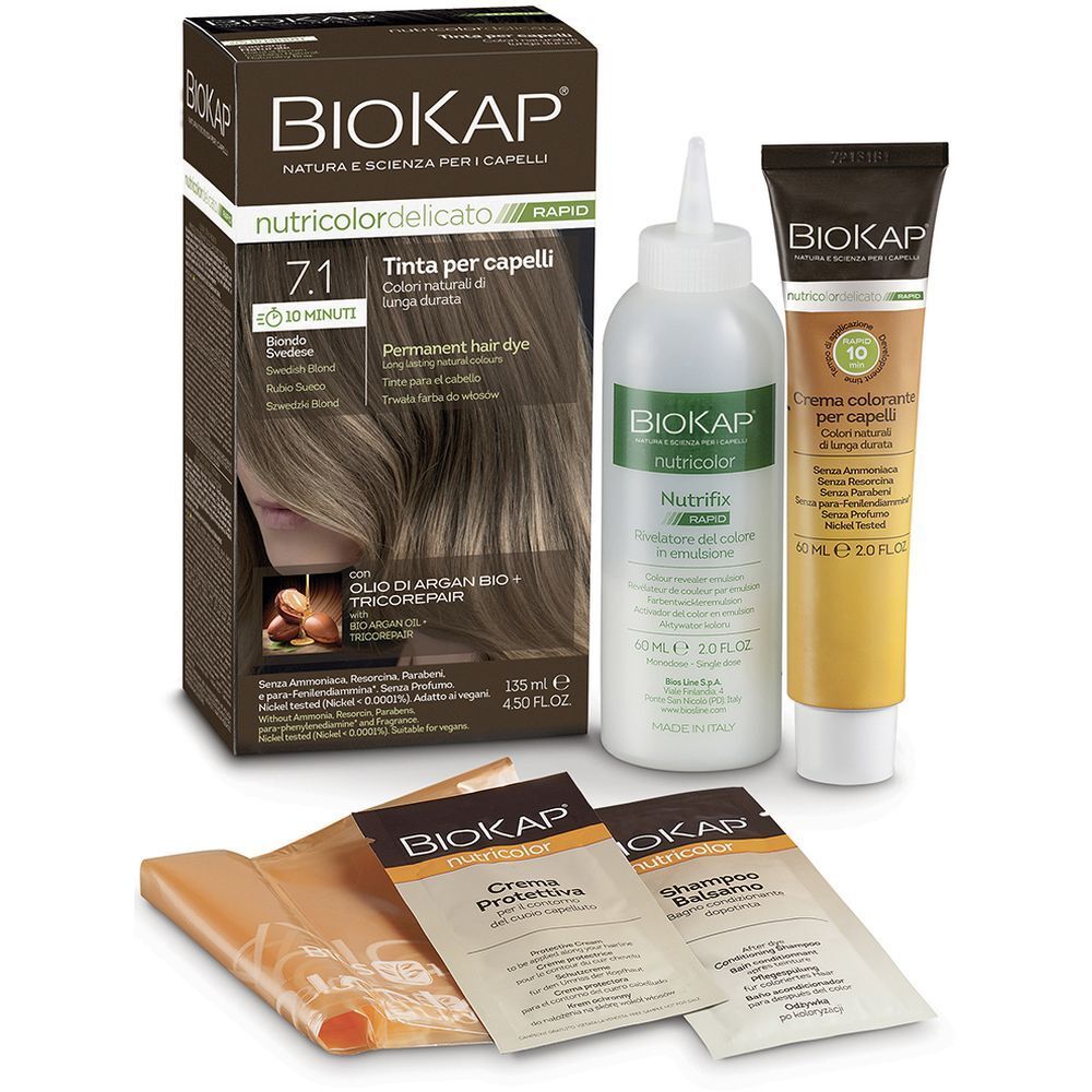 Set di tintura per capelli. Include flacone, tubo, bustine e confezione. Scritta: Biokap Nutricolor Delicato Rapid 7,1.