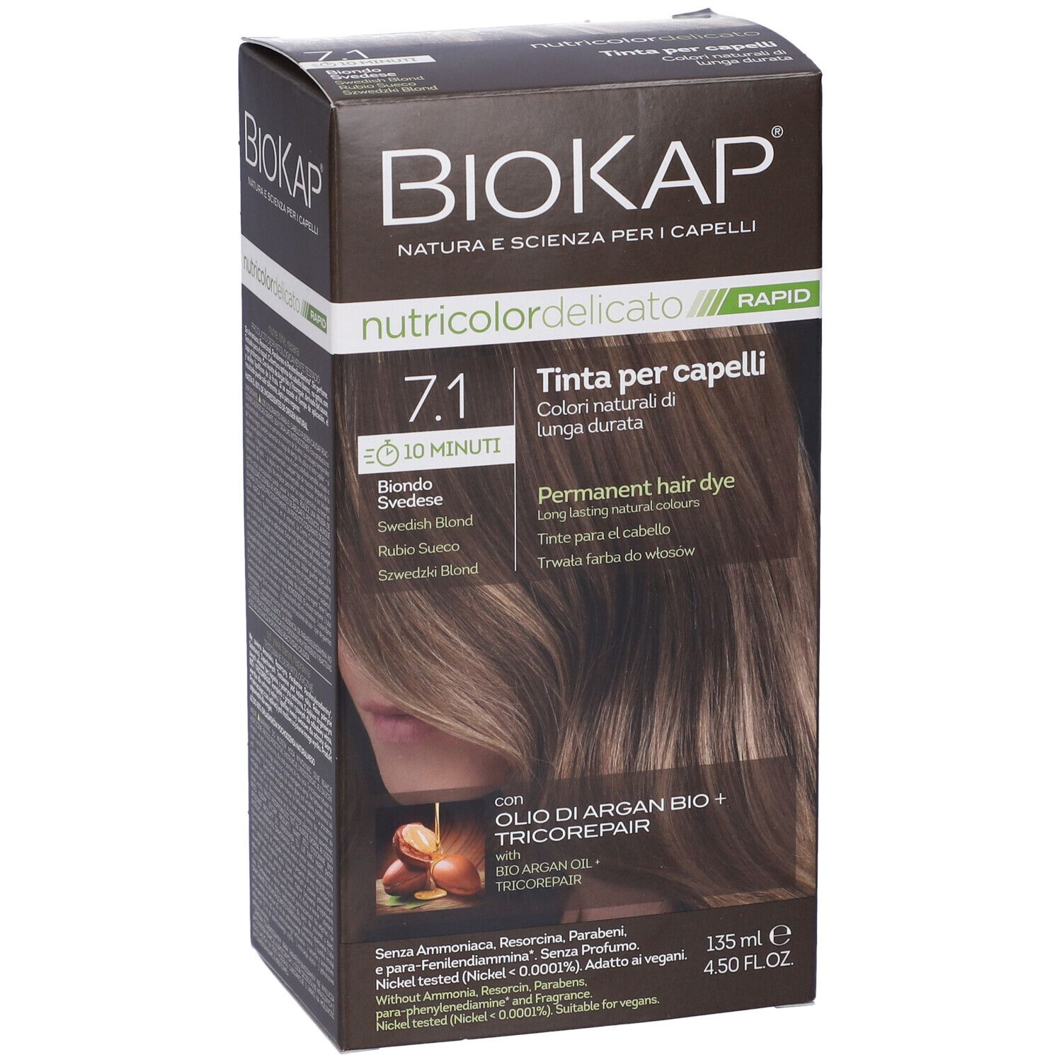 Scatola di tintura per capelli. Scritta: Biokap Nutricolor Delicato Rapid 7,1. Immagine di capelli. Con olio di Argan e Tricorepair.