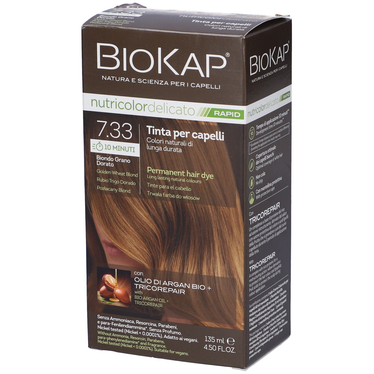 Scatola marrone con "Biokap Nutricolor Delicato Rapid 7.33". Scritto: "Tinta per capelli". Immagine di colore per capelli.