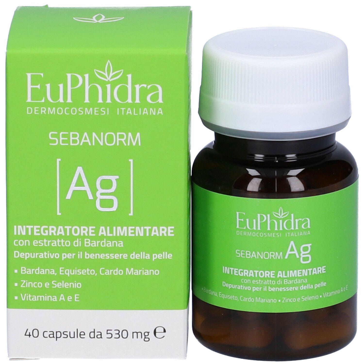 Flacone e scatola del prodotto. Scatola verde con nome prodotto e ingredienti. Flacone accanto.