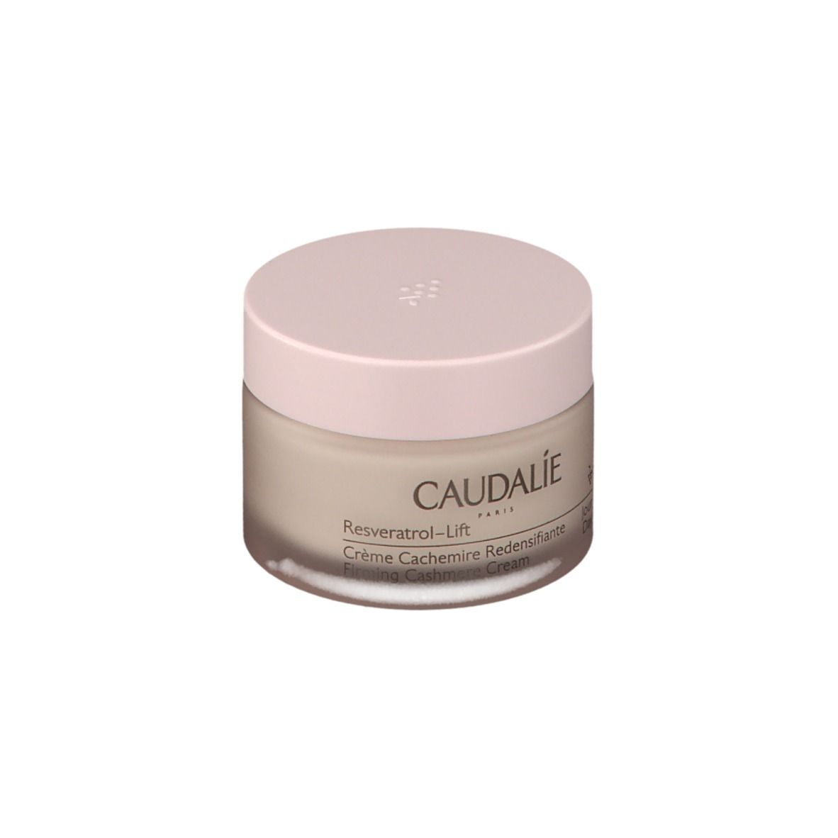 Pot de crème avec couvercle rose. Inscription: CAUDALIE, Resveratrol-Lift, Crème Cachemire Redensifiante.