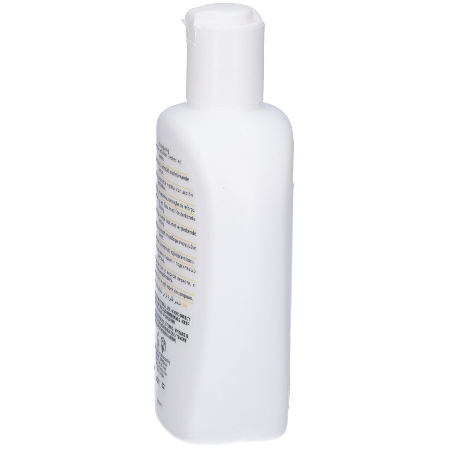 Retro di un flacone di shampoo bianco. Testo in più lingue.