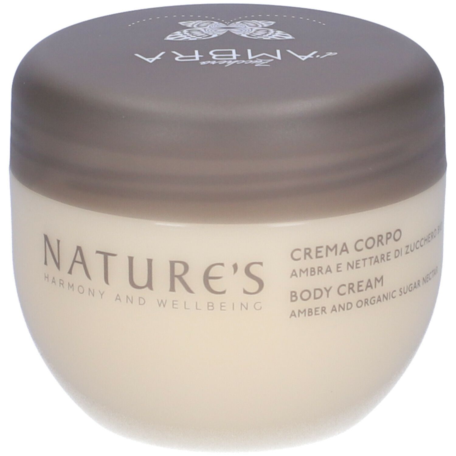Vaso di crema con coperchio. Scritta NATURE'S, CREMA CORPO, AMBRA E NETTARE DI ZUCCHERO BIO, BODY CREAM, AMBER AND ORGANIC SUGAR NECTAR.