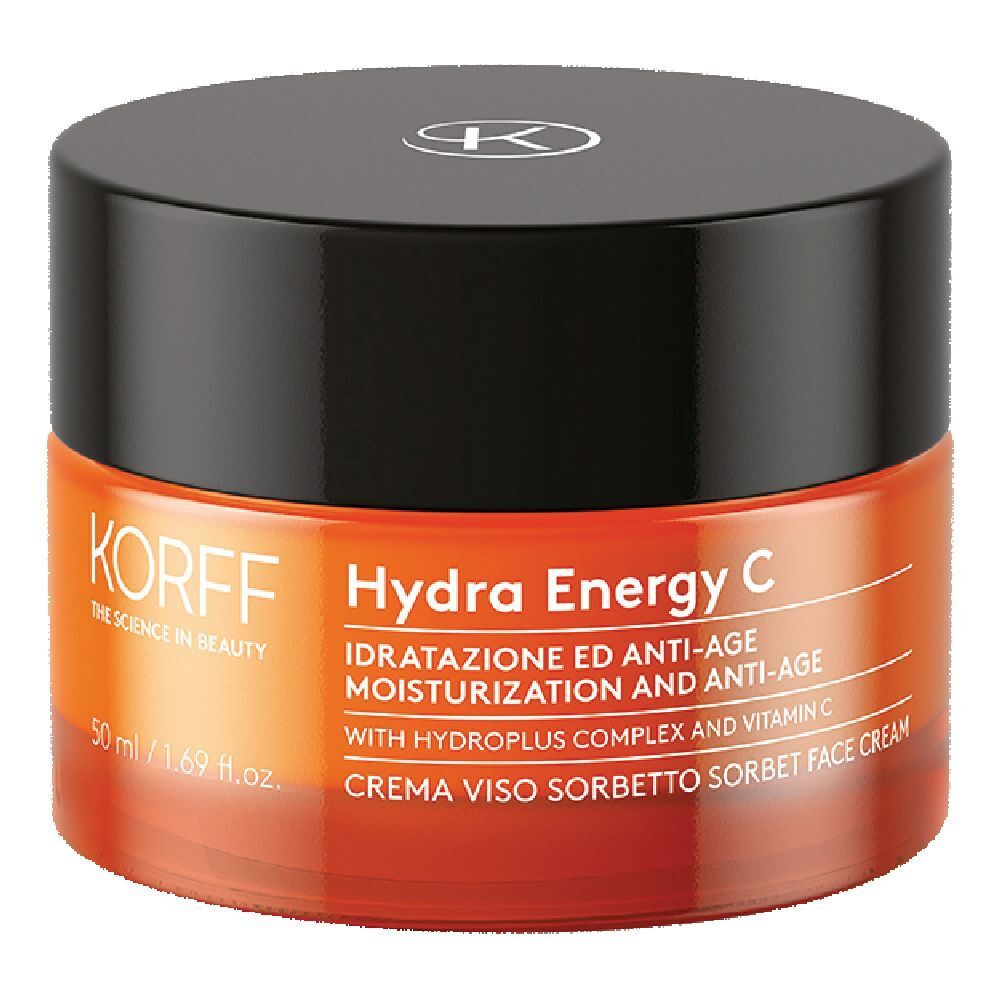 Vaso rotondo con coperchio nero. Scritta: KORFF Hydra Energy C. Contenitore arancione con informazioni sul prodotto.