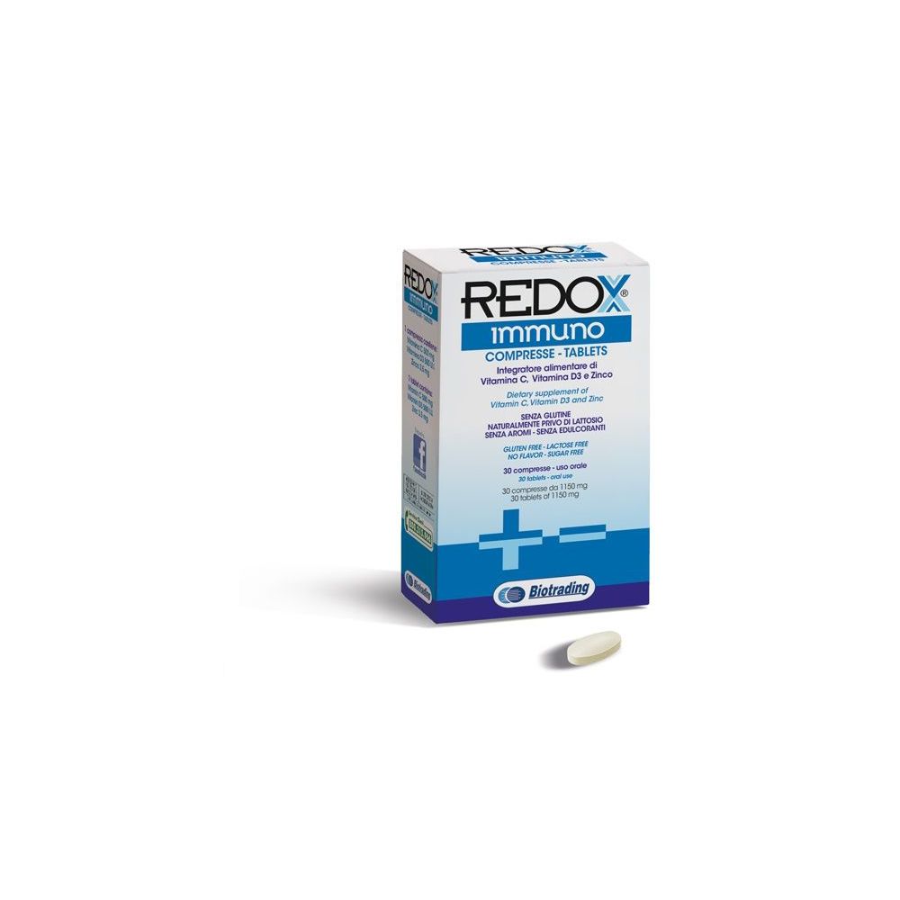 Scatola di compresse Redox Immuno. Confezione blu e bianca con nome e ingredienti. Una compressa è accanto.