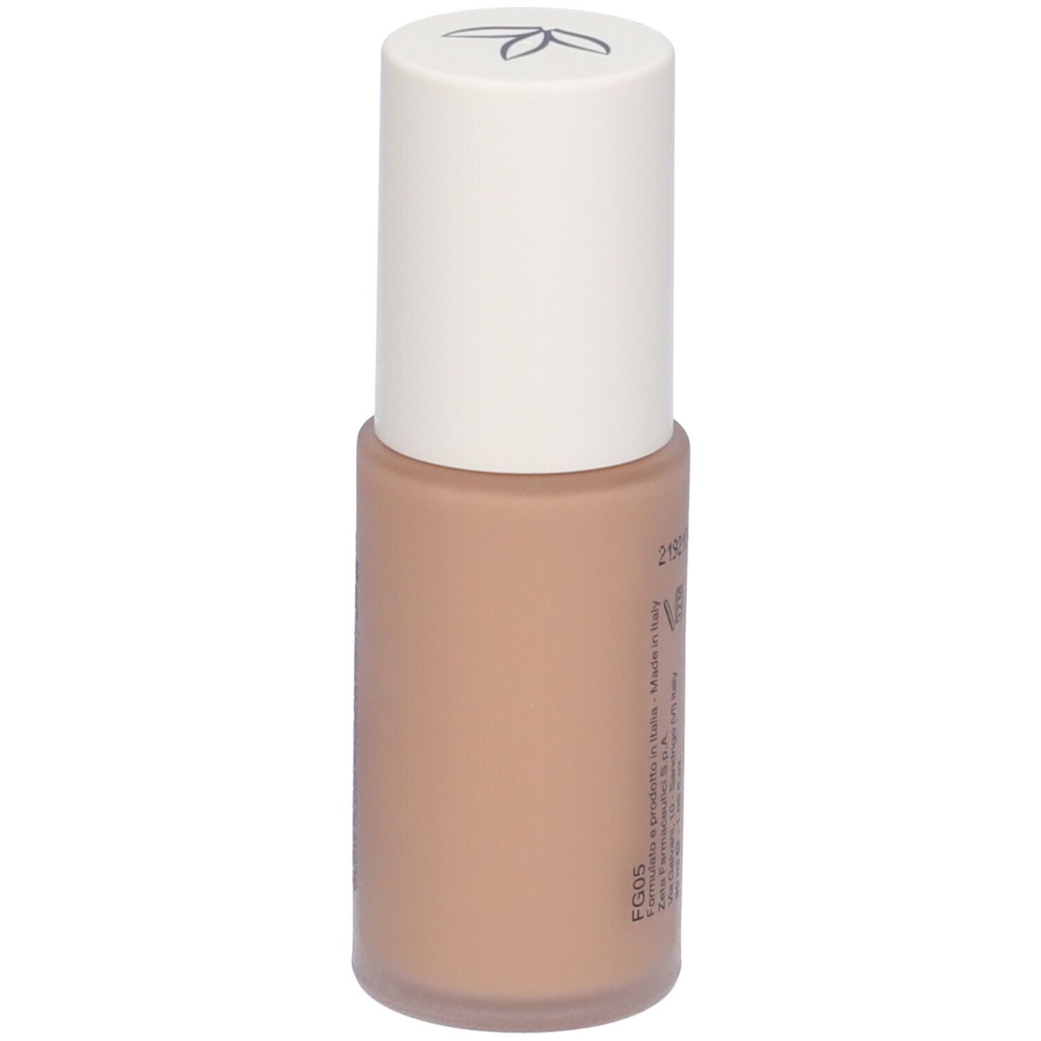 Fondotinta fluido beige in flacone con tappo bianco. Scritta non leggibile.