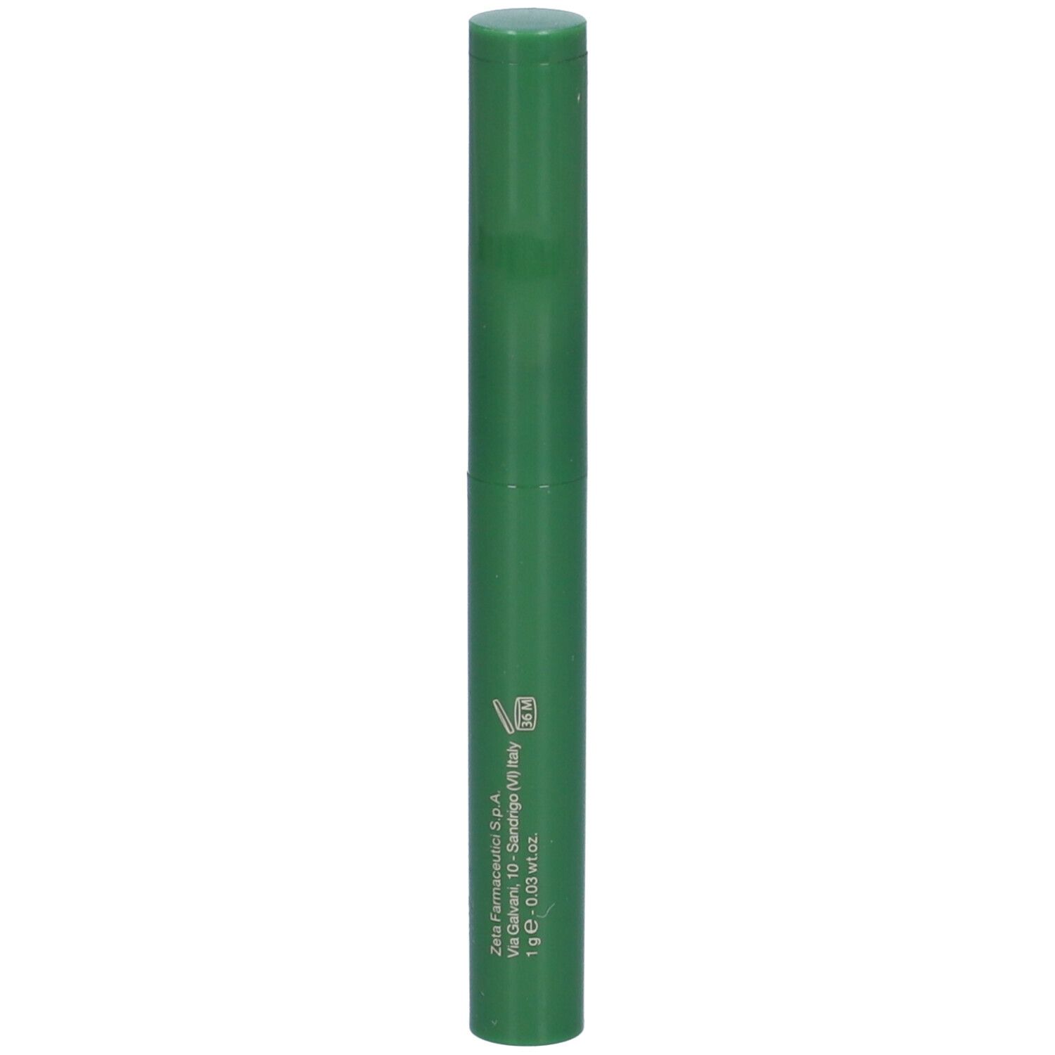 Ombretto verde a forma di stick. Forma cilindrica con tappo. Scritta: 1 g e - 0,03 oz.