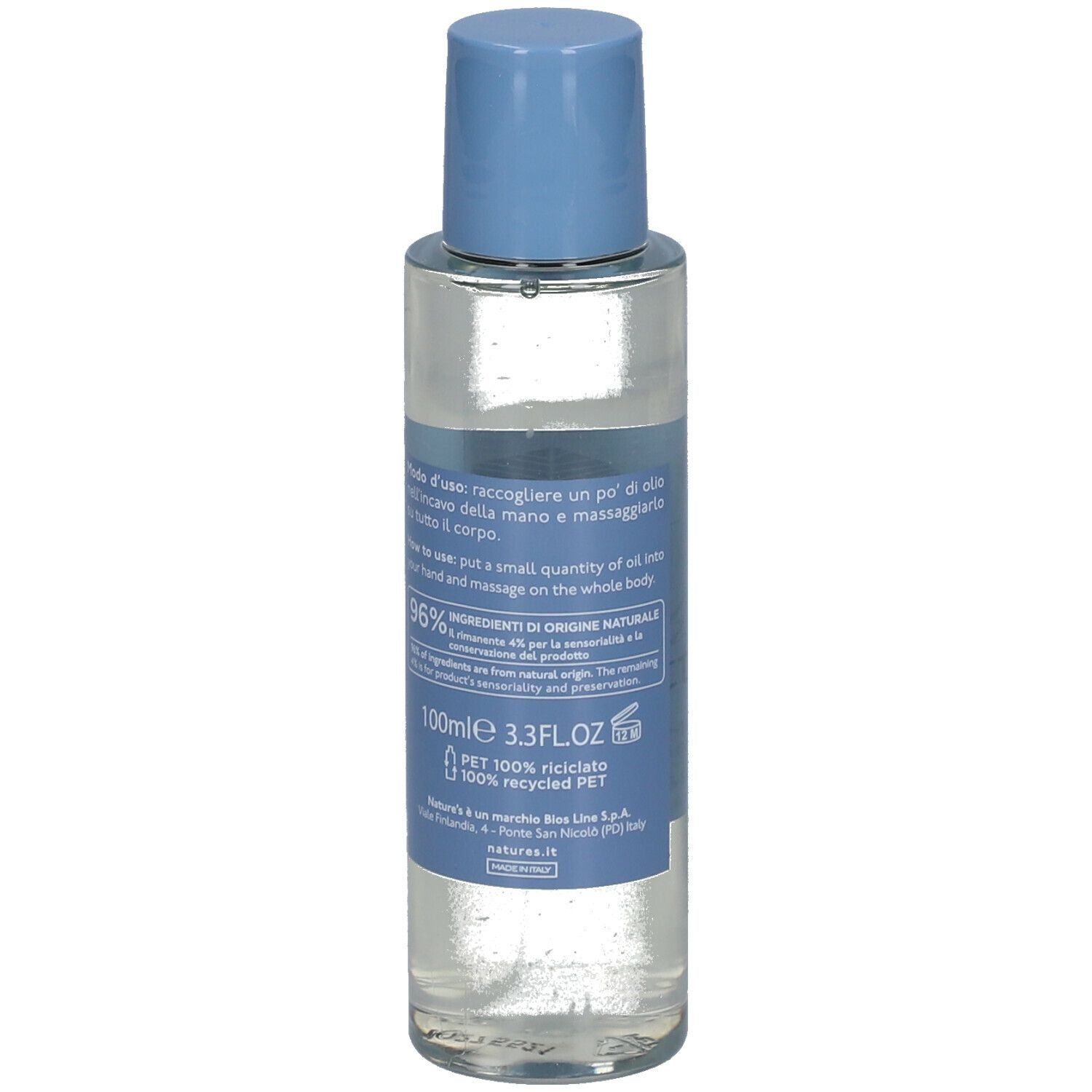 Flacone trasparente con tappo blu. Scritta: fiori notturni. Olio massaggio. Lavanda e fiore della sera bio.
