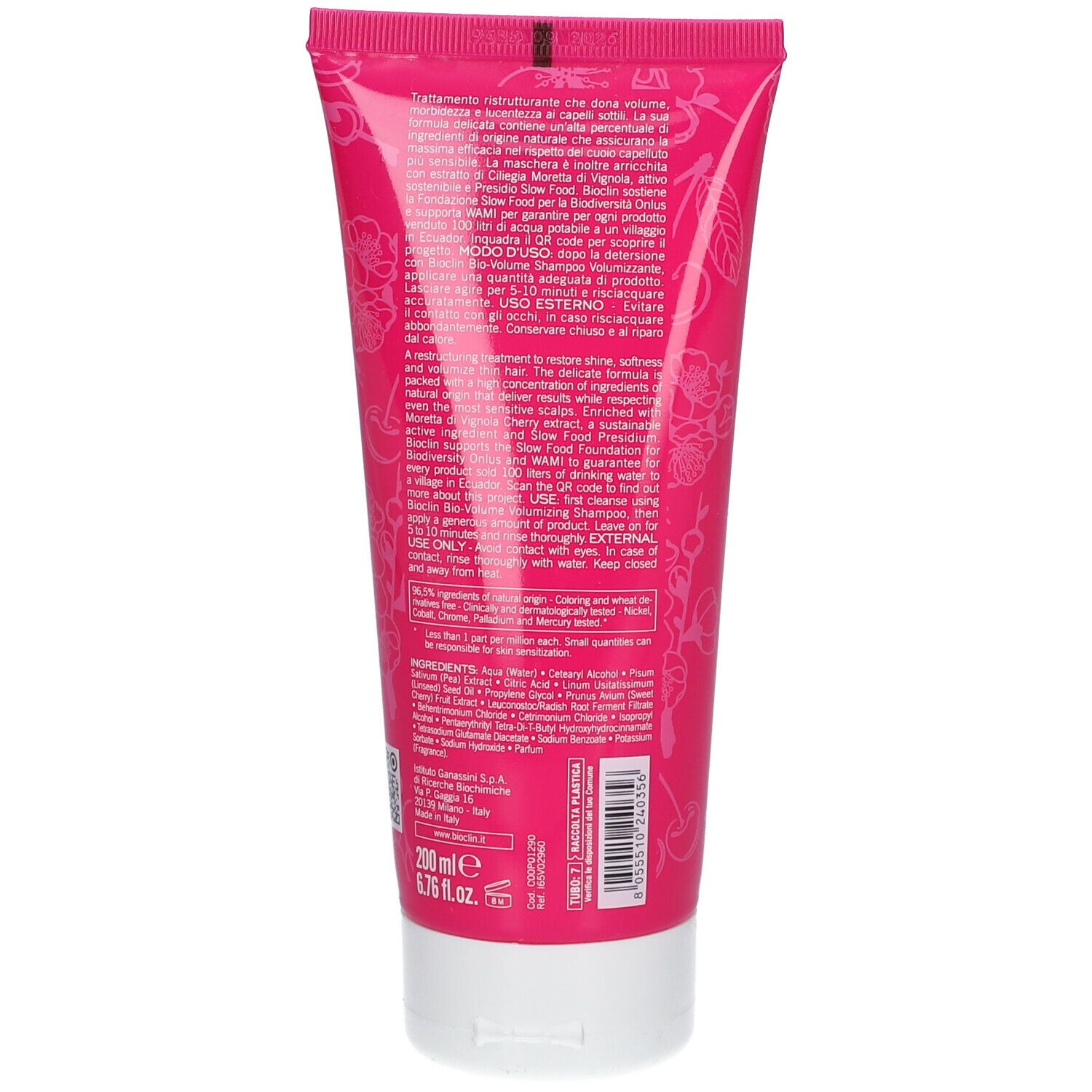Retro di un tubo rosa con tappo bianco. Testo multilingue. Contiene ingredienti e informazioni del produttore.
