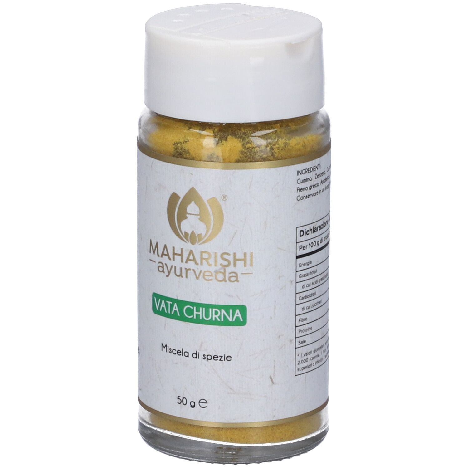 Glasbehälter mit gelbem Inhalt. Aufschrift: Maharishi Ayurveda, Vata Churna, Miscela di spezie, 50 g. Zutatenliste.