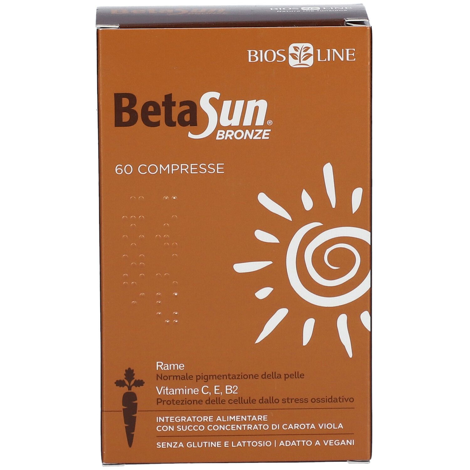 Scatola marrone BetaSun Bronze con 60 compresse. Scritta: Normale pigmentazione, Vitamina C, E, B2. Con succo di carota.