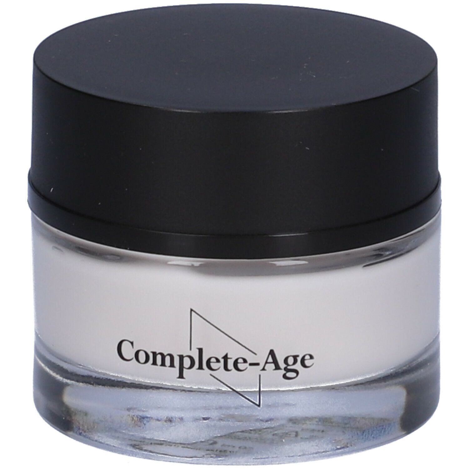 Vasetto di crema con coperchio nero. Scritta: Complete-Age.