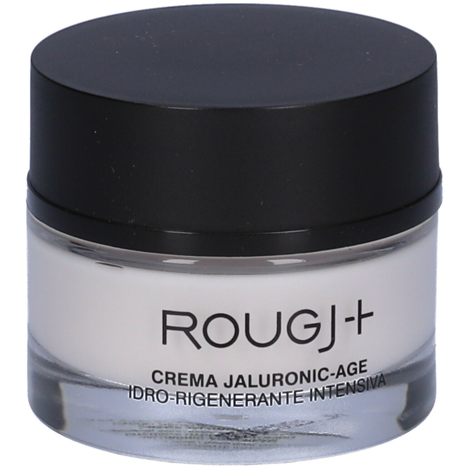 Vasetto di crema con coperchio nero. Scritta: ROUGJ+ CREMA JALURONIC-AGE IDRO-RIGENERANTE INTENSIVA.