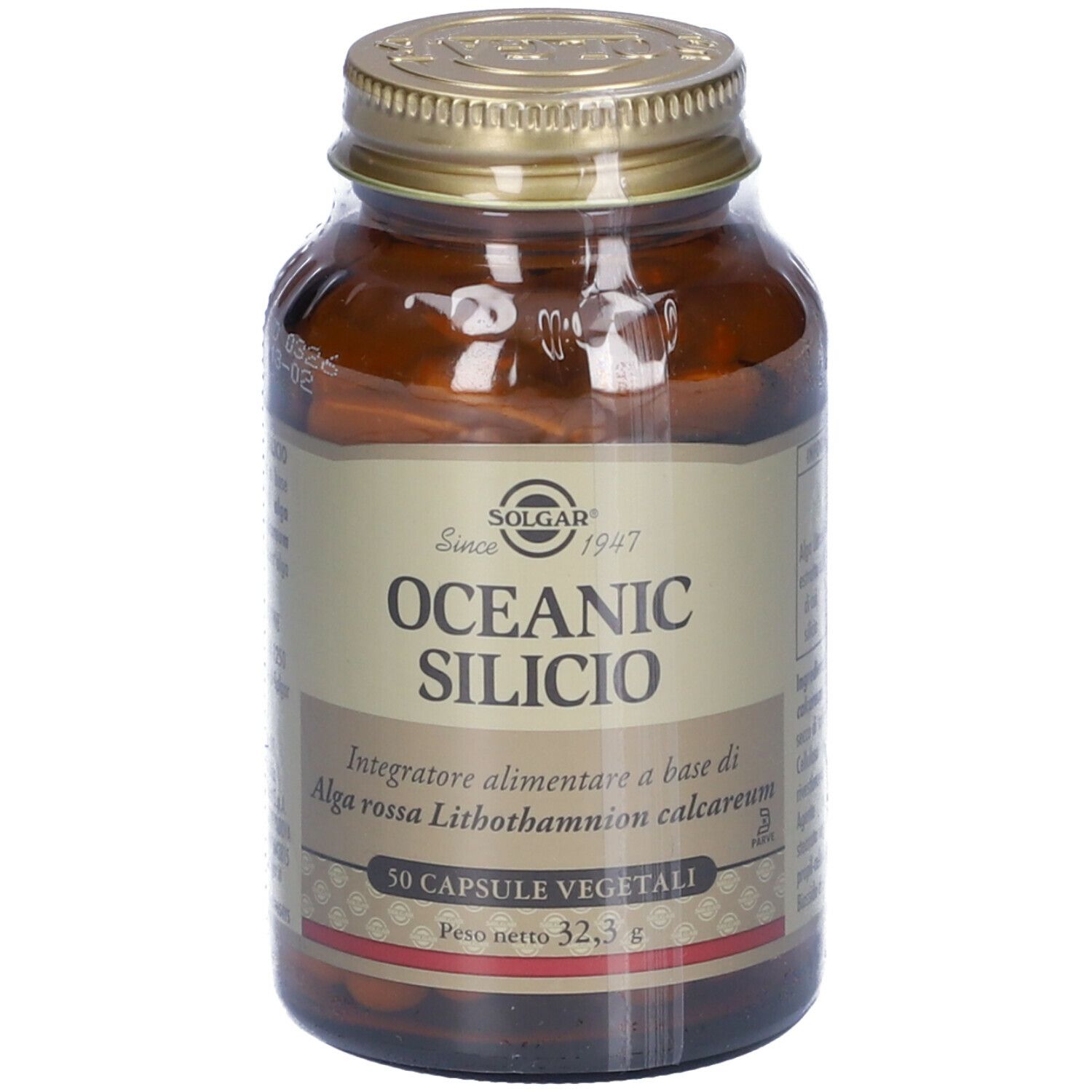 Flacone di vetro marrone con tappo dorato. Scritta: OCEANIC SILICIO, 50 capsule. Marchio: SOLGAR.