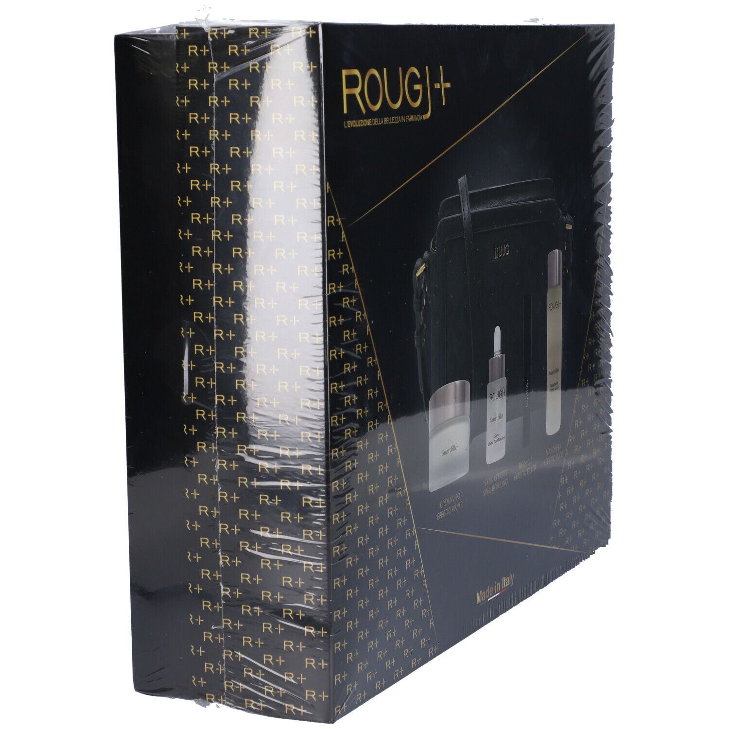 Vista laterale della confezione regalo con cosmetici. Scritta: Rougj. Confezionato in pellicola.