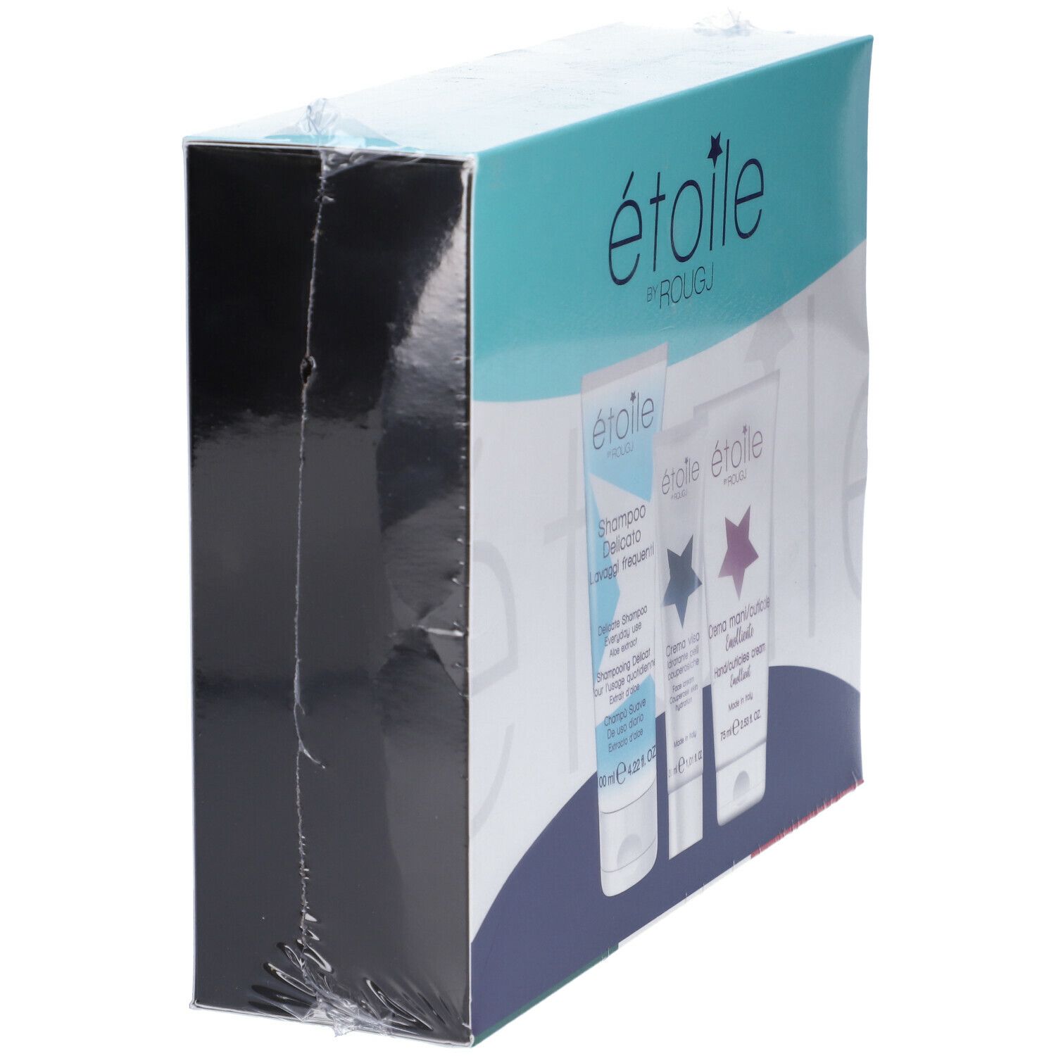 Confezione con tre prodotti cosmetici. Scritta: étoile by Rougj. Prodotti in tubi.