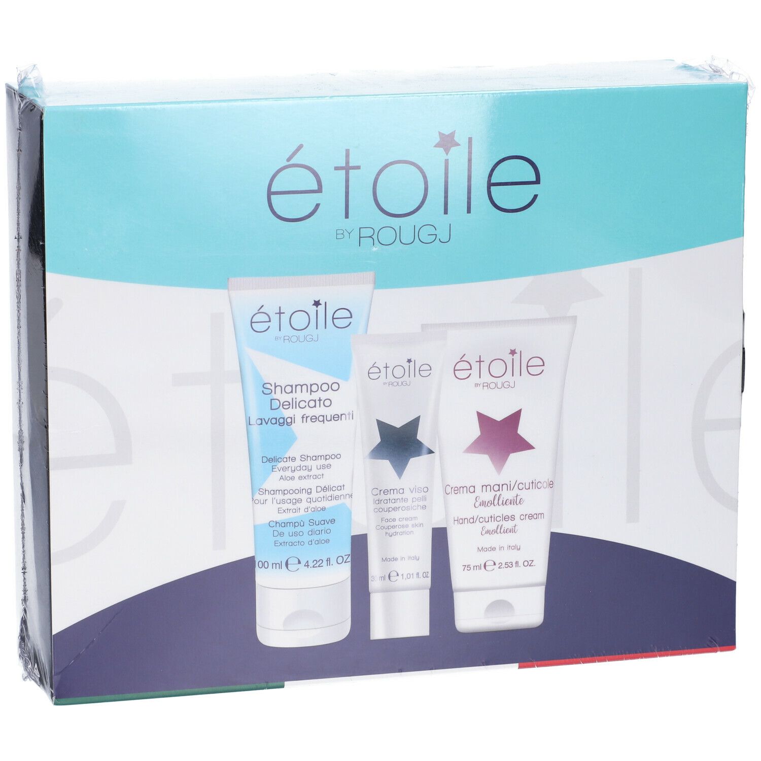 Confezione con tre prodotti cosmetici. Scritta: étoile by Rougj. Prodotti in tubi.