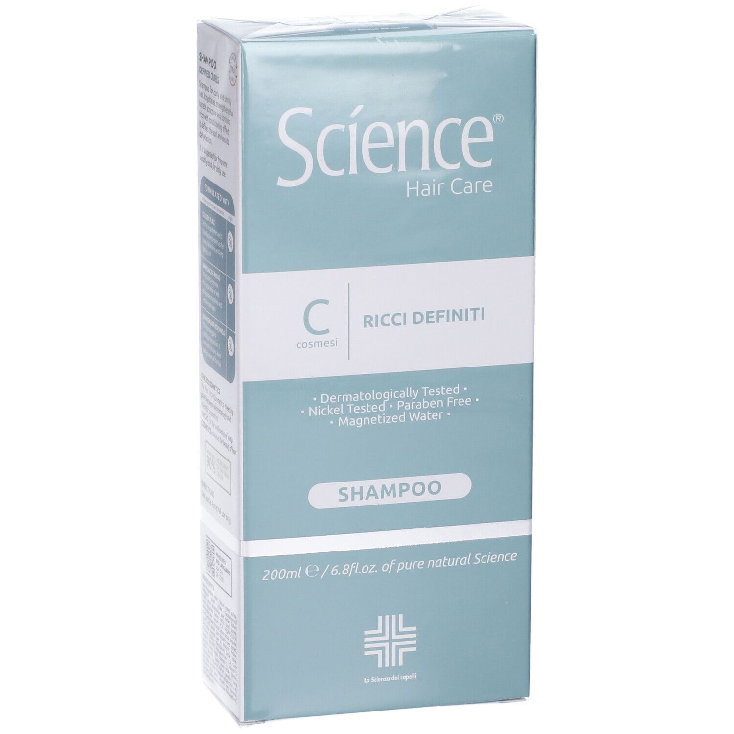 Confezione del prodotto. Scatola verde e bianca con immagine di shampoo. Scritta: Science Hair Care, Ricci Definiti, Shampoo. Dermatologicamente testato.