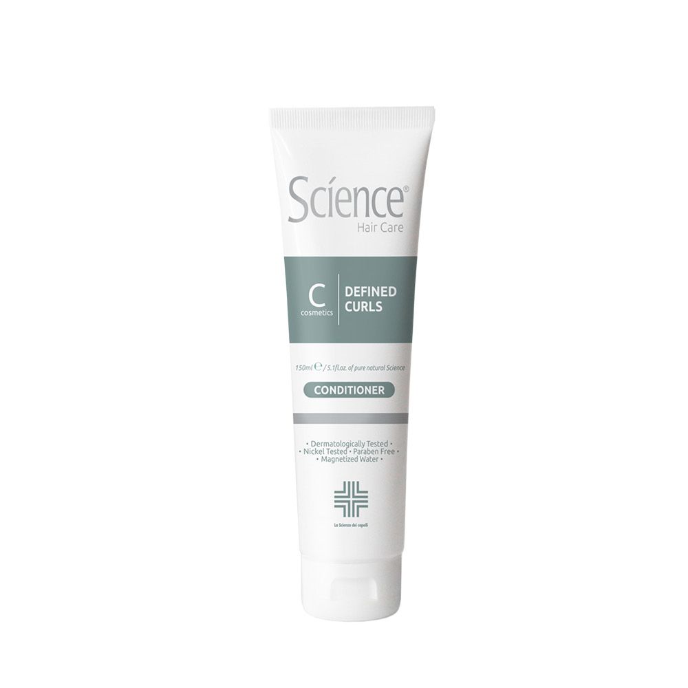 Tubo bianco con scritta « Science Hair Care » e « Defined Curls ». « Conditioner » sotto. Logo in basso.