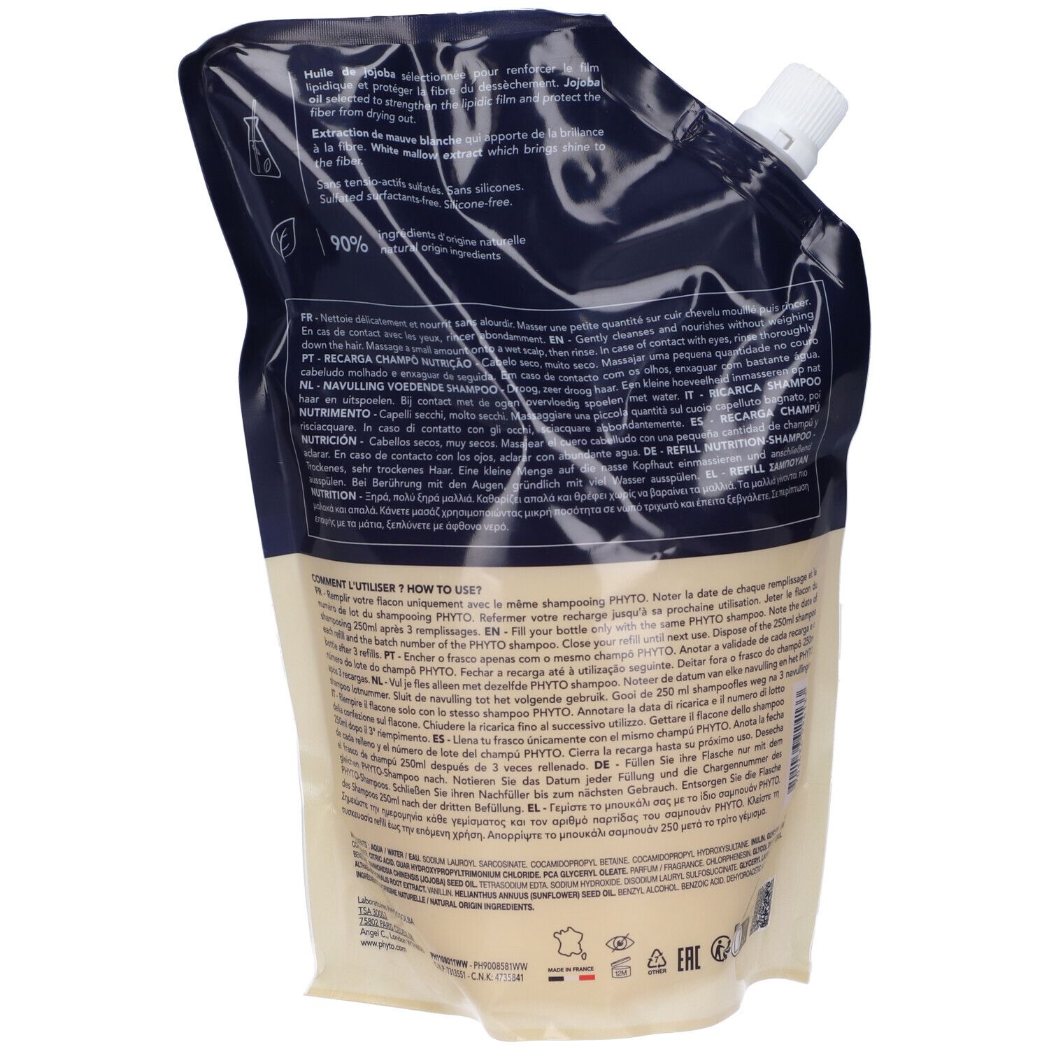 Retro della ricarica shampoo. Testo multilingue, tra cui italiano e francese.