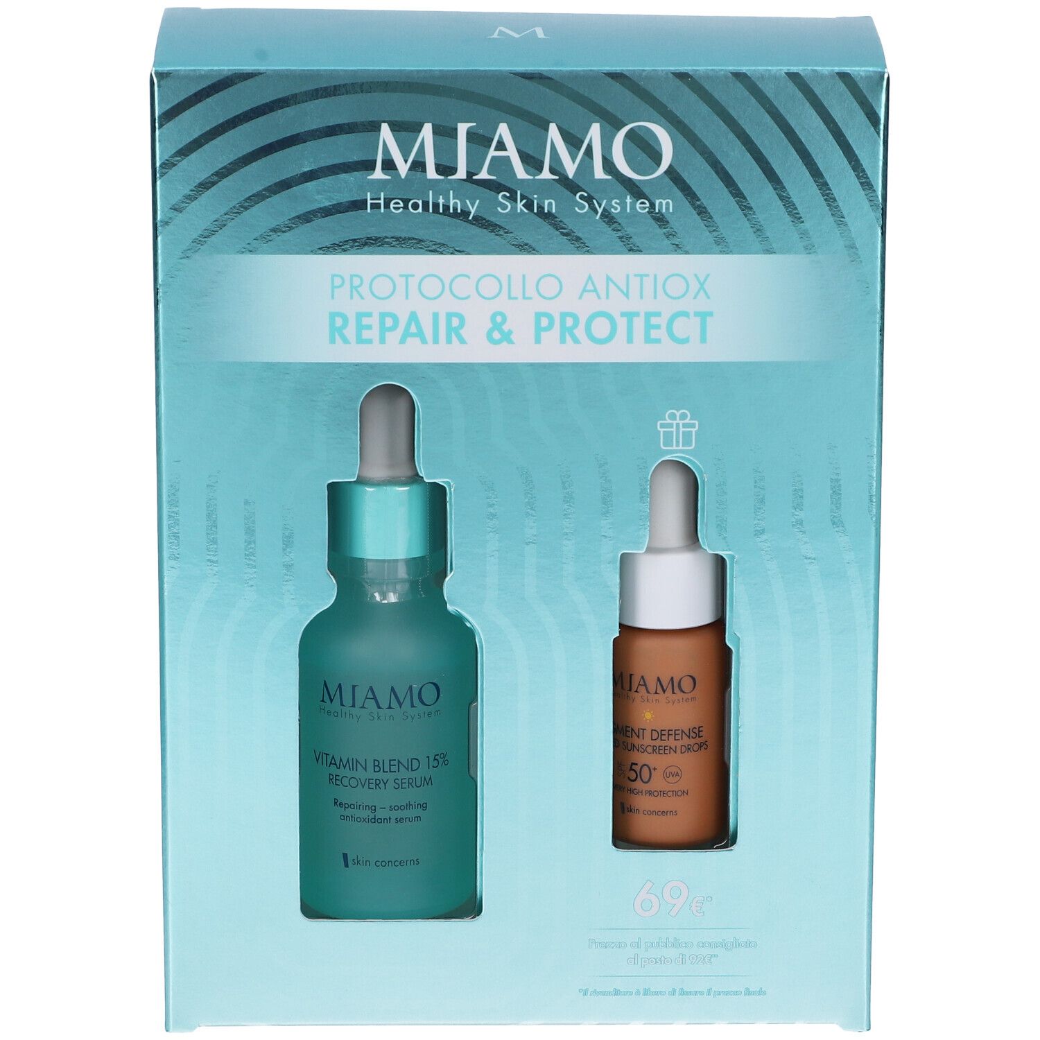 Confezione regalo con due flaconi. Scritta: MIAMO, PROTOCOLLO ANTIOX REPAIR & PROTECT. Un flacone verde e uno marrone.