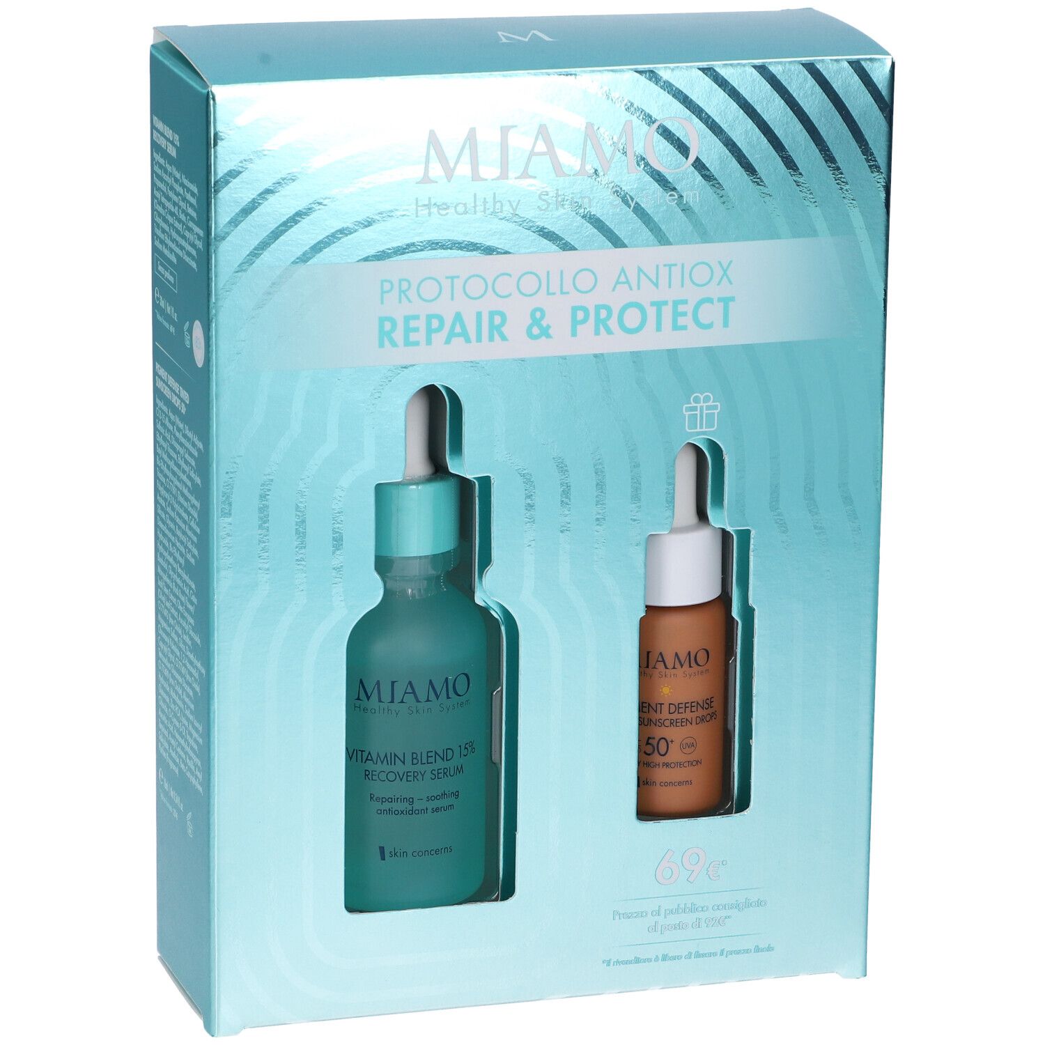 Confezione regalo con due flaconi. Scritta: MIAMO, PROTOCOLLO ANTIOX REPAIR & PROTECT. Un flacone verde e uno marrone.