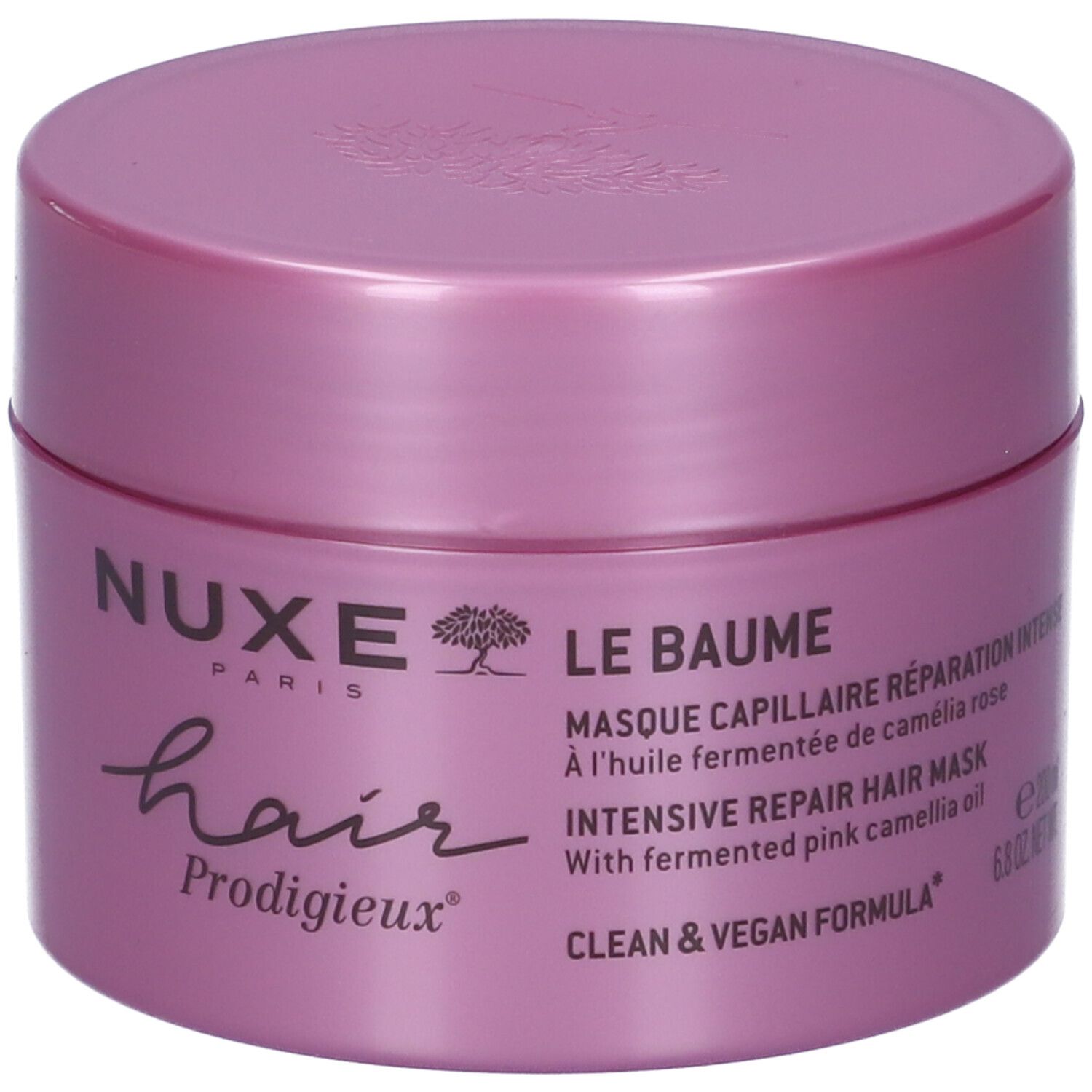 Nuxe Haarkur im rosa Tiegel mit Aufschrift 'Le Baume', 'Intensive Repair Hair Mask'.