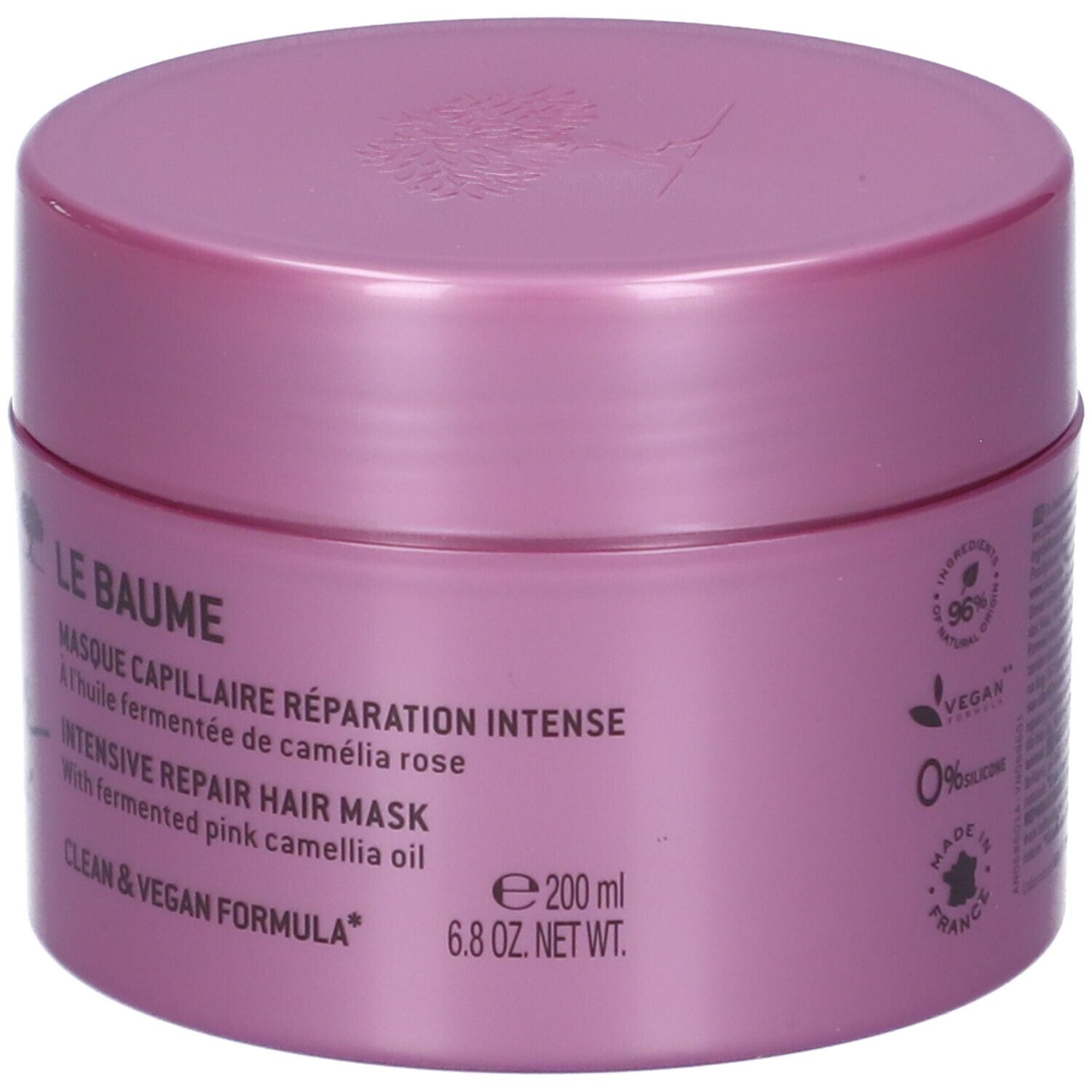 Ein pinker Haarkur-Behälter mit 200 ml Inhalt. Enthält fermentiertes Kamelienöl. Vegan und ohne Silikone.